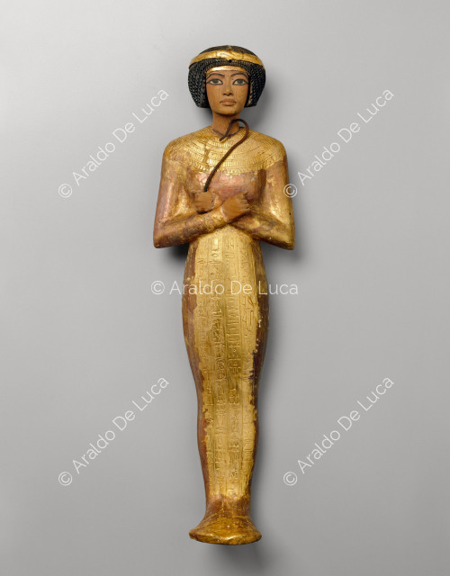 Trésor de Toutânkhamon. Ushabty en or avec perruque nubienne