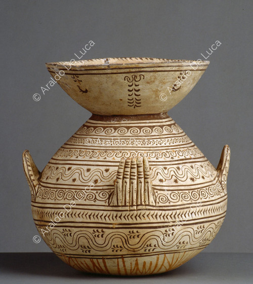 Olla with geometric and plant motifs