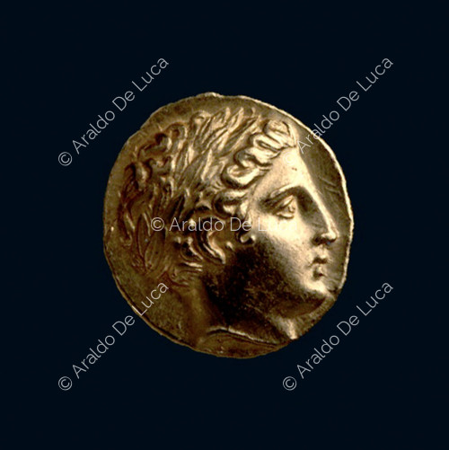 Münze, die den Lorbeerkopf des Apollo darstellt