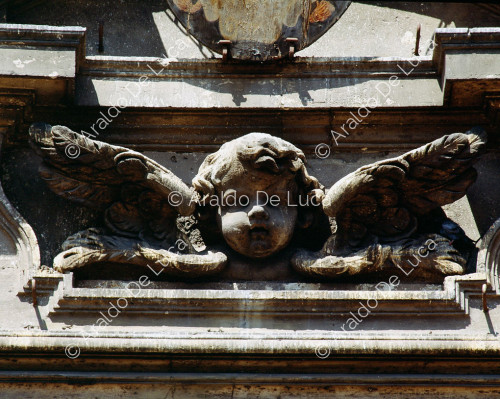 Winged Cherub in the façade decoration - Church of Sant'Agnese in Agone, detail