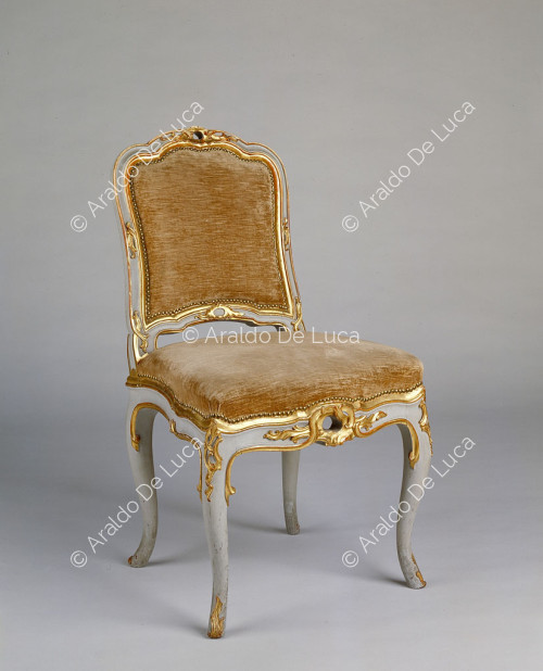 Carved, sculpted and gilded wooden chair