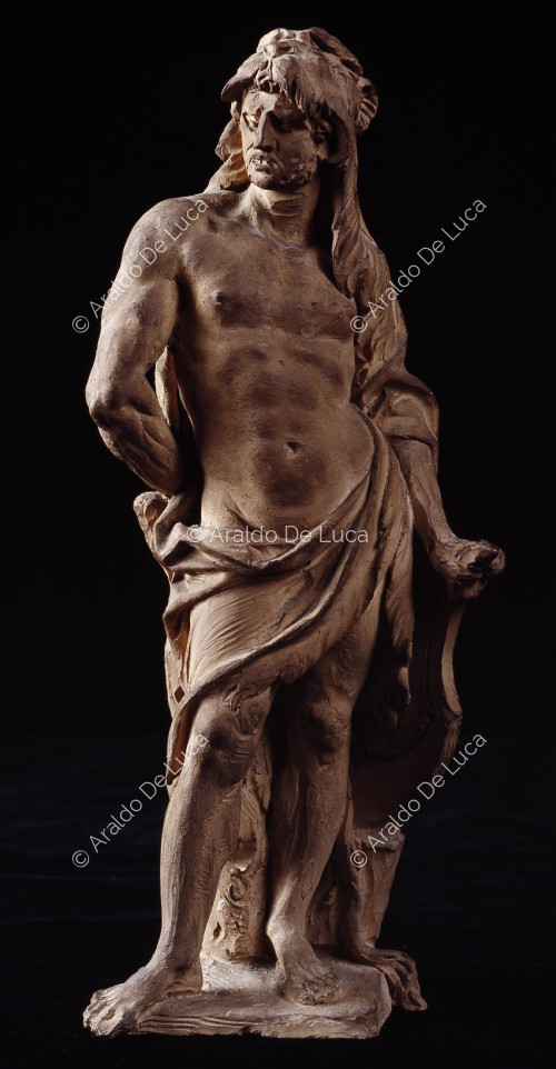 Escultura de figura masculina