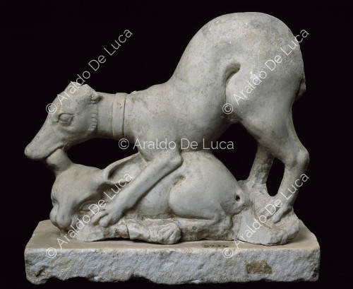 Marble group with greyhound biting a rabbit
