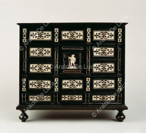 Inlaid cabinet with onion supports